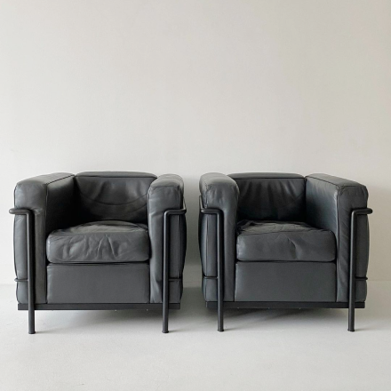 two black leather sofas